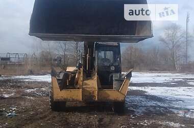 Фронтальный погрузчик Caterpillar TH 2002 в 