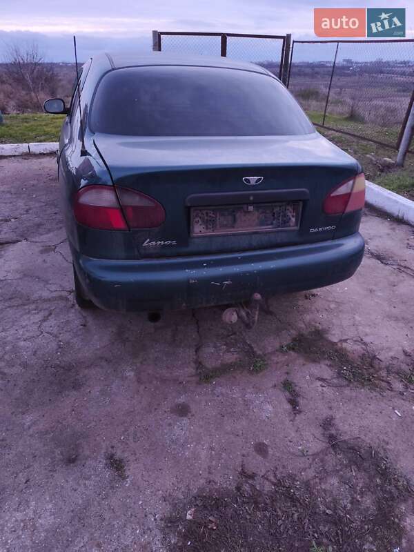 1998 Daewoo Lanos, VIN KLATF69YEWB249018:plate — фото 1 (autoria)