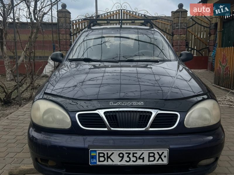 2005 Daewoo Lanos, VIN Y6DTF69YD6W261977:plate — фото 1 (autoria)