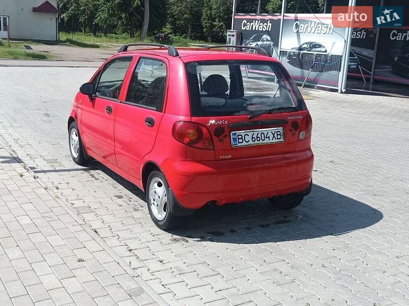 2006 Daewoo Matiz, VIN XWB4A11BV6A076592:plate — photo 1 (autoria)