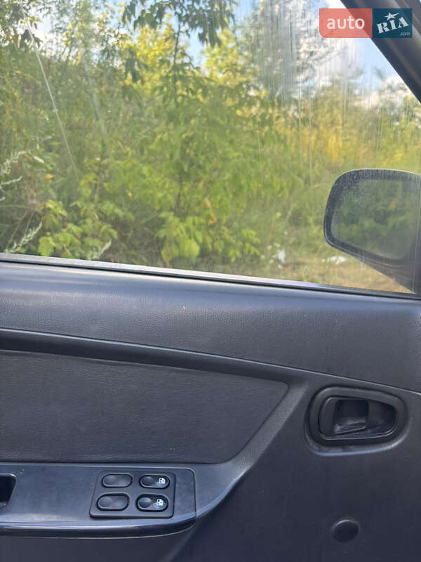 Седан Daewoo Nexia 2011 в Вишневом фото 11 Седан Daewoo Nexia 2011 в Вишневом