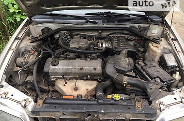Лифтбек Daihatsu Applause 1999 в 