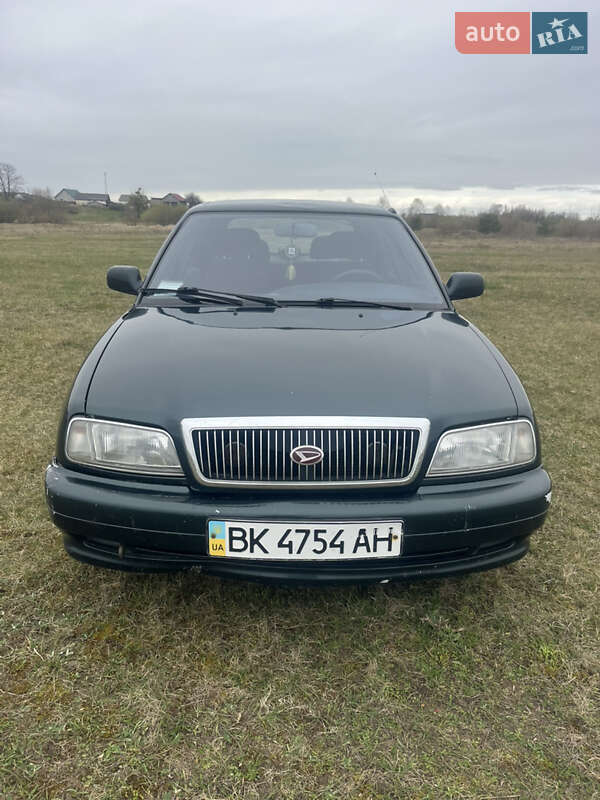Лифтбек Daihatsu Applause 1999 в 