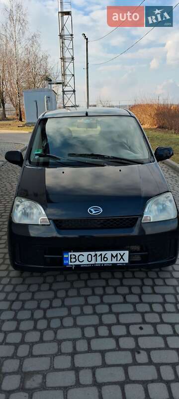 Хэтчбек Daihatsu Cuore 2004 в 