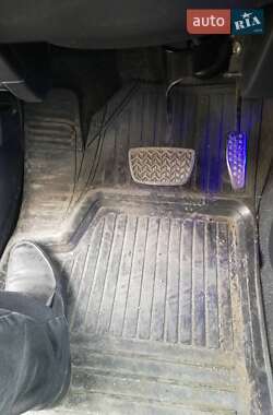 Хэтчбек Daihatsu Cuore 2003 в 