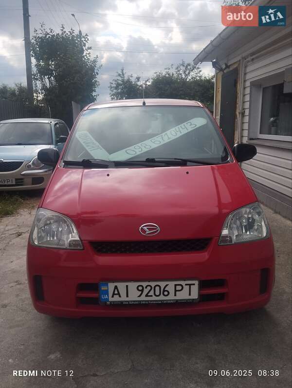 Хэтчбек Daihatsu Cuore 2004 в 