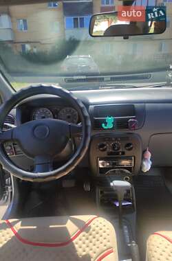 Хэтчбек Daihatsu Cuore 2005 в 