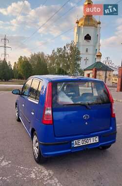 Хэтчбек Daihatsu Cuore 2004 в 