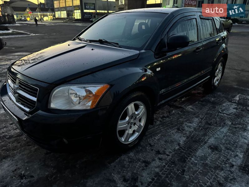 2008 Dodge Caliber, VIN 1B3HBG8AX9D115571:plate — фото 1 (autoria)