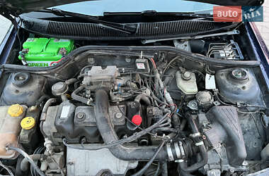 Хэтчбек Ford Escort 1996 в 