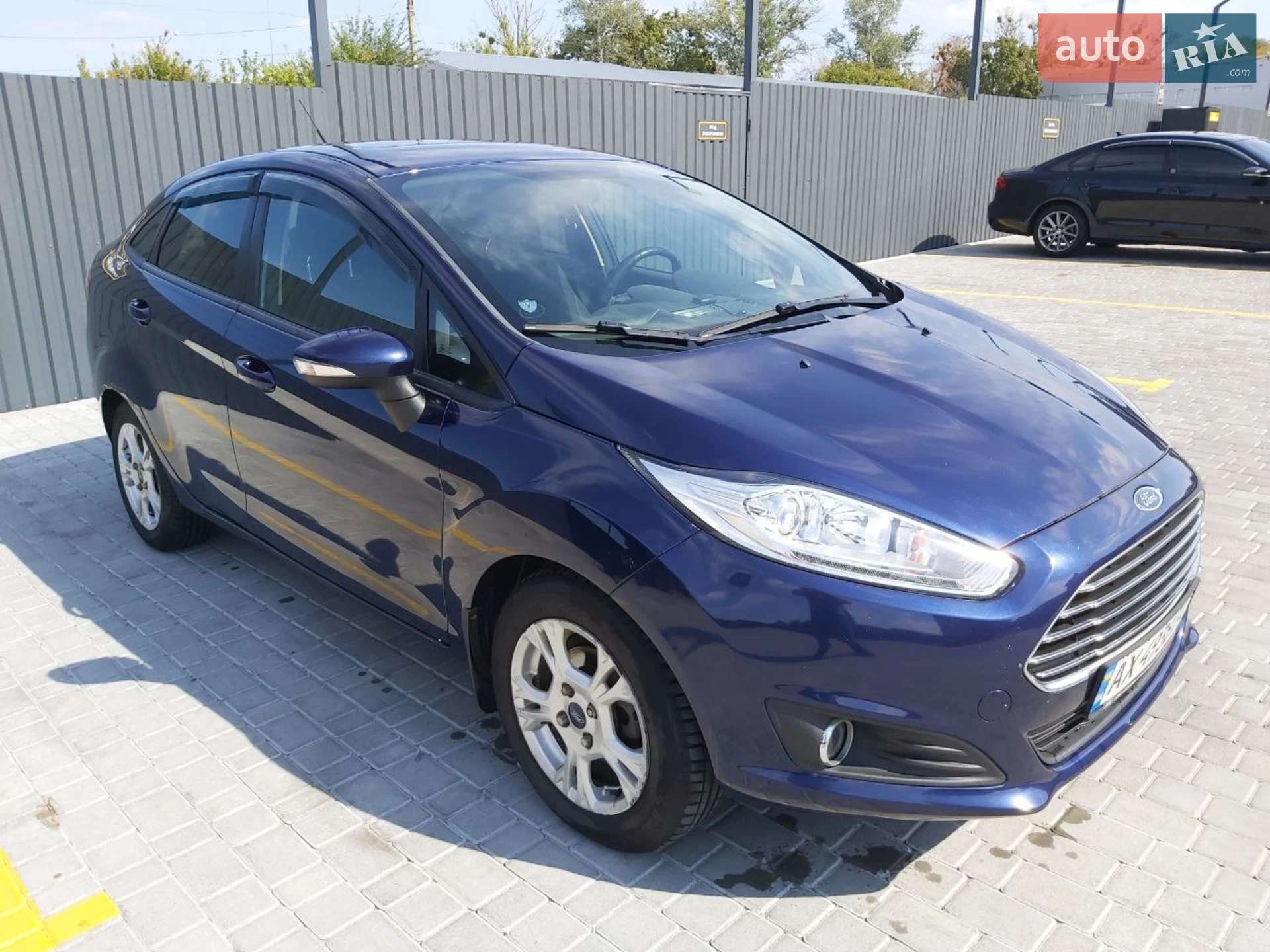 Ford Fiesta 2015 VIN 3FADP4BJ7GM103570 фото оголошення 2 з 14