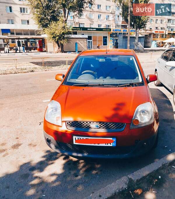 2007 Ford Fiesta, VIN WF0HXXWPJH7M01323:plate — фото 1 (autoria)