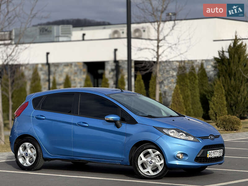 2012 Ford Fiesta, VIN WF0JXXGAJJCC65222:plate — фото 1 (autoria)