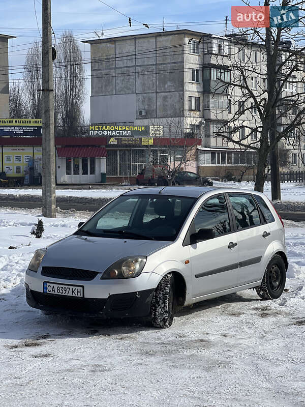 2007 Ford Fiesta, VIN WF0HXXGAJH7U51371:plate — фото 1 (autoria)