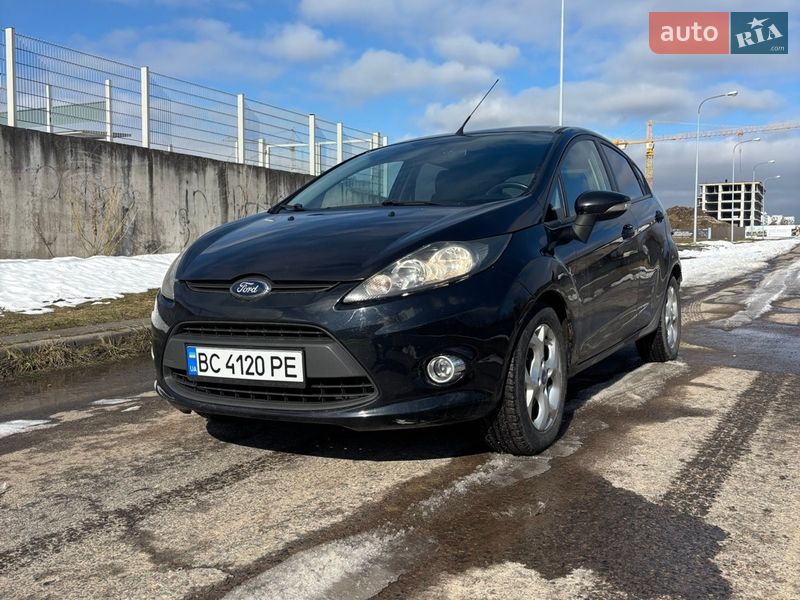 2012 Ford Fiesta, VIN WF0JXXGAJJCB14434:plate — фото 1 (autoria)