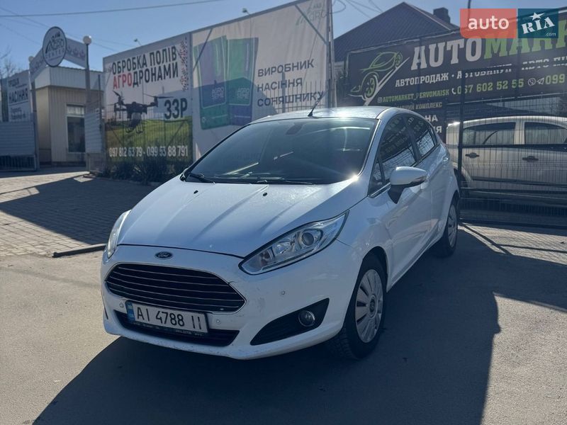 2016 Ford Fiesta, VIN WF0DXXGAKDGG25410:plate — фото 1 (autoria)