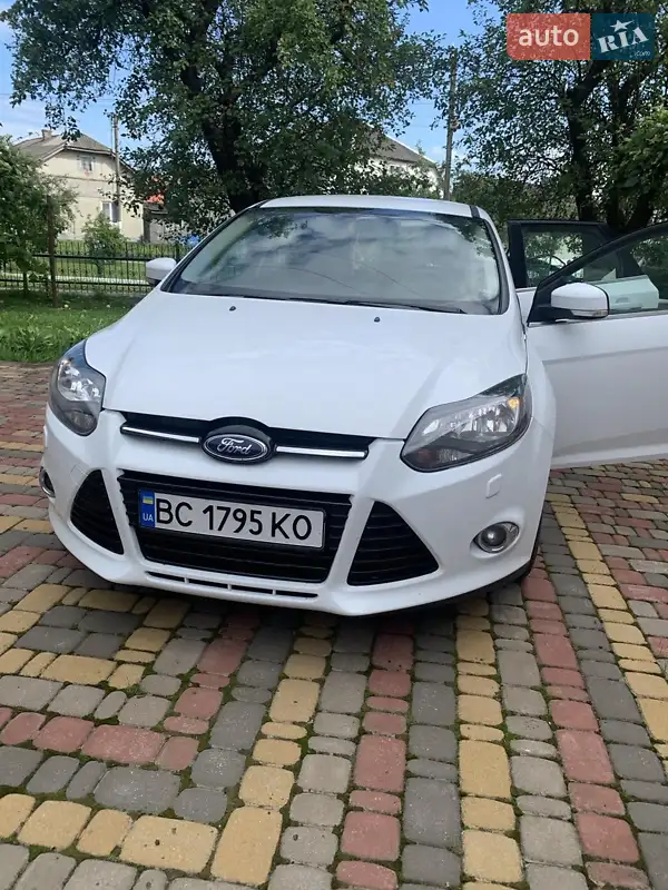 Ford Focus 2013 VIN WF0KXXGCBKDE37938 фото оголошення 14 з 52