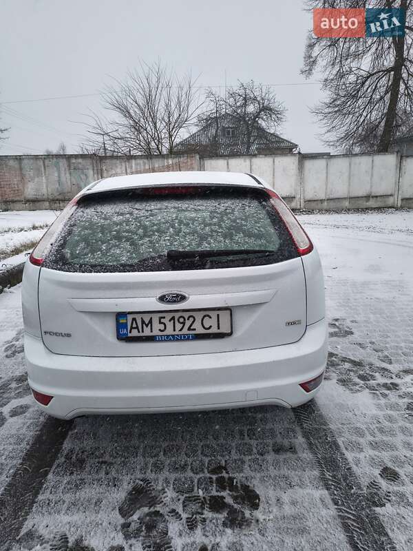 2010 Ford Focus, VIN WF0PXXGCDPAU29496:plate — фото 1 (autoria)