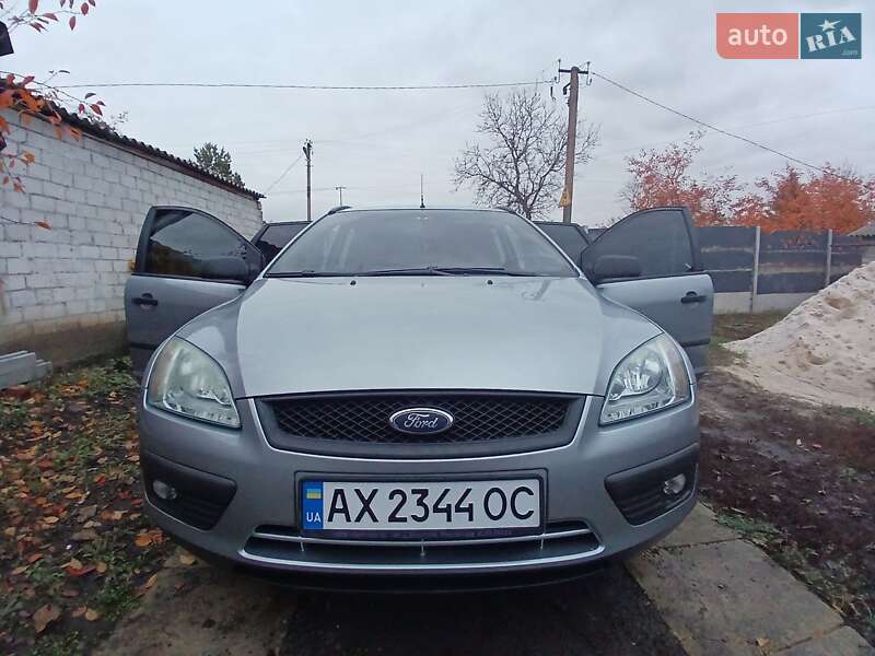 2005 Ford Focus, VIN WF0WXXGCDW5B77148:plate — фото 1 (autoria)