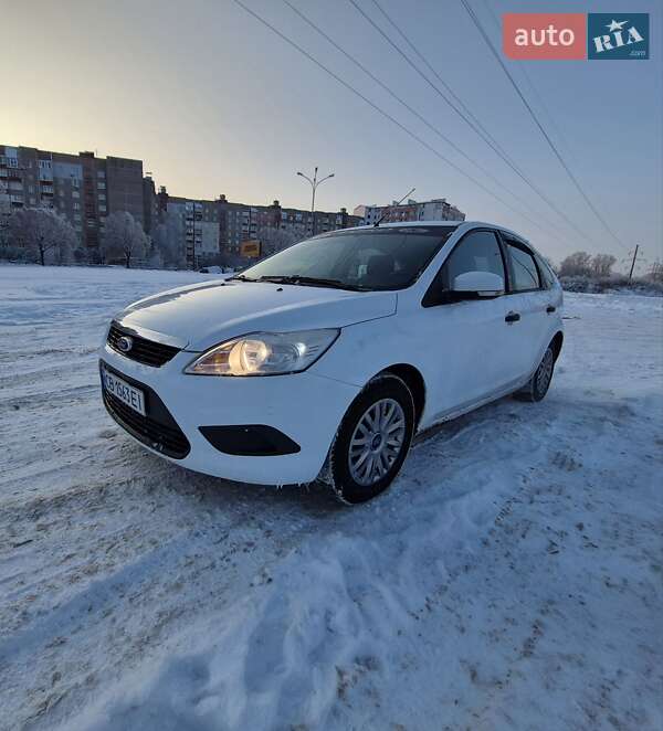 2011 Ford Focus, VIN WF0PXXWPDPBC73174:plate — фото 1 (autoria)