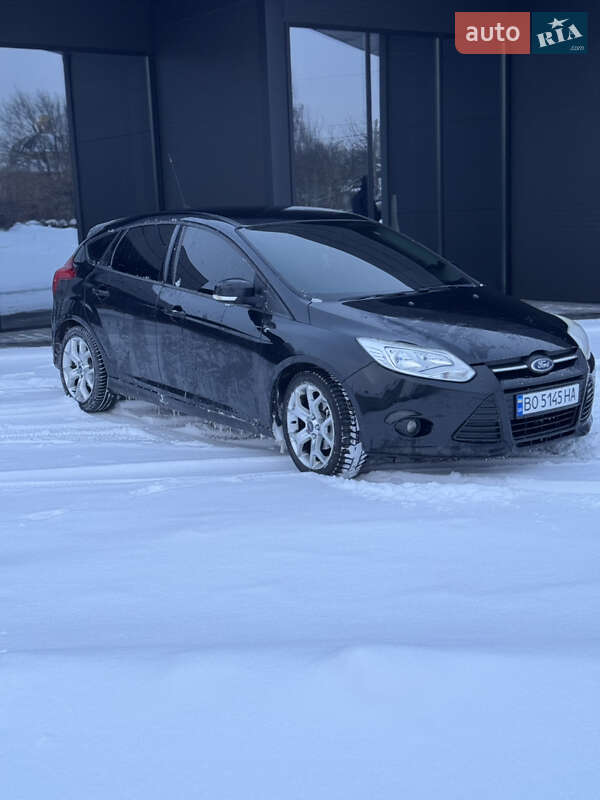 2012 Ford Focus, VIN WF0KXXGCBKCB49013:plate — фото 1 (autoria)