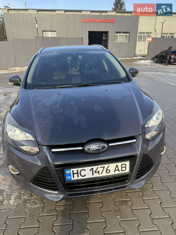 2013 Ford Focus, VIN WF0LXXGCBLDG42556:plate — фото 1 (autoria)