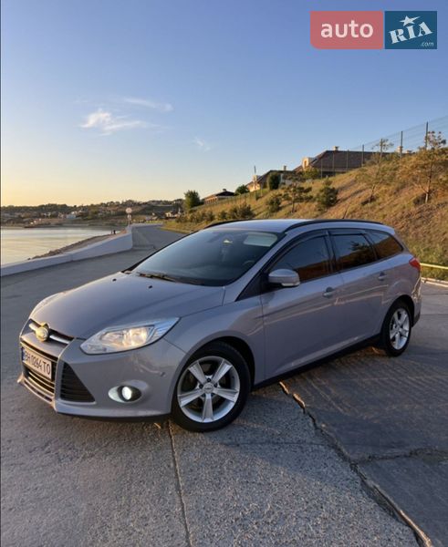 2011 Ford Focus, VIN WF0LXXGCBLBU48026:plate — фото 1 (autoria)