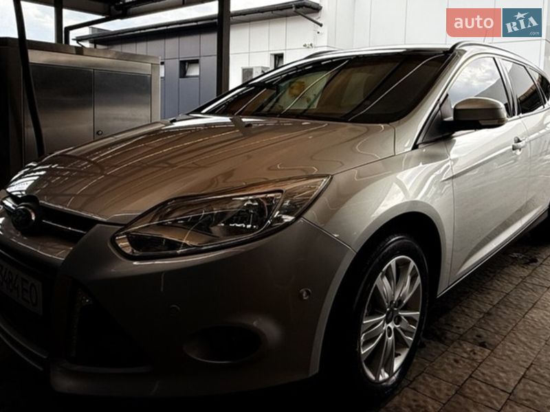 2014 Ford Focus, VIN WF0LXXGCBLEY13616:plate — фото 1 (autoria)