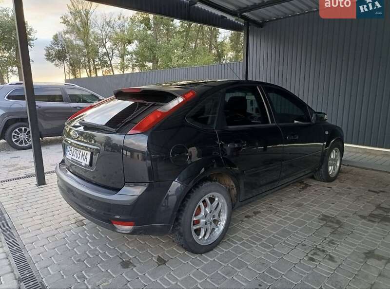 2007 Ford Focus, VIN WF05XXGCD57D43088:plate — фото 1 (autoria)
