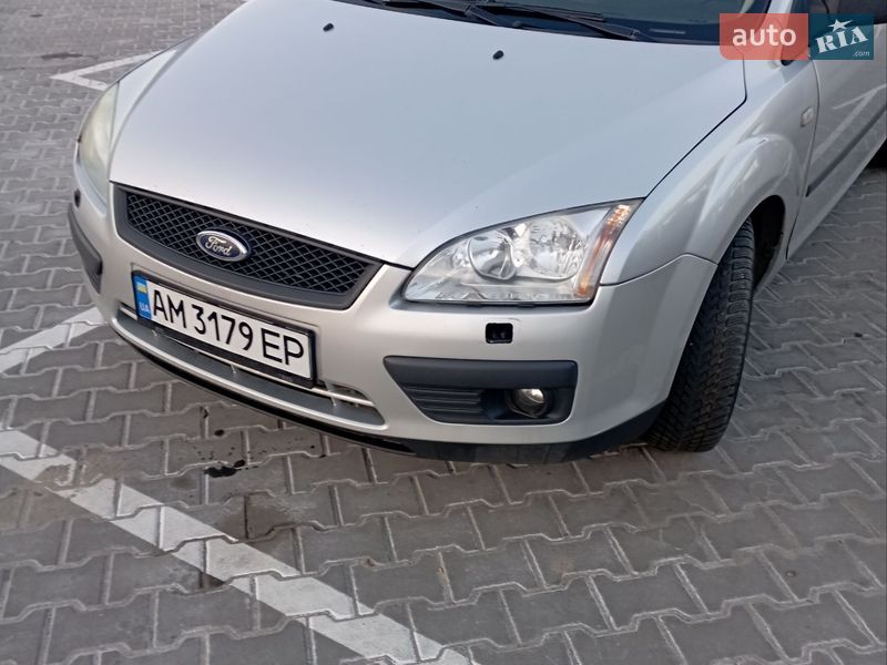 2006 Ford Focus, VIN WF0WXXGCDW6J67015:plate — фото 1 (autoria)