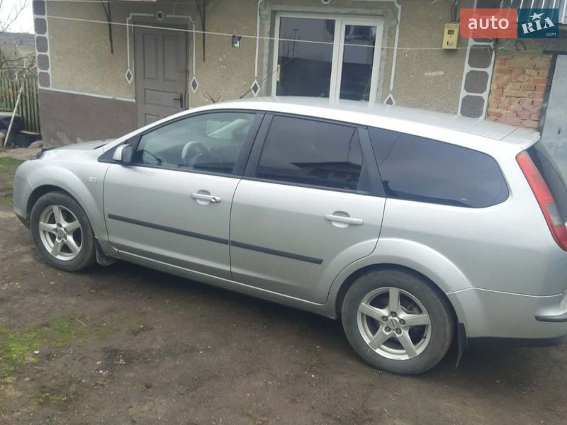 2006 Ford Focus, VIN WF0WXXGCDW6A58261:plate — фото 1 (autoria)