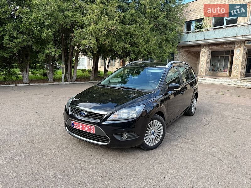 2009 Ford Focus, VIN WF0SXXGCDS8E67084:plate — фото 1 (autoria)