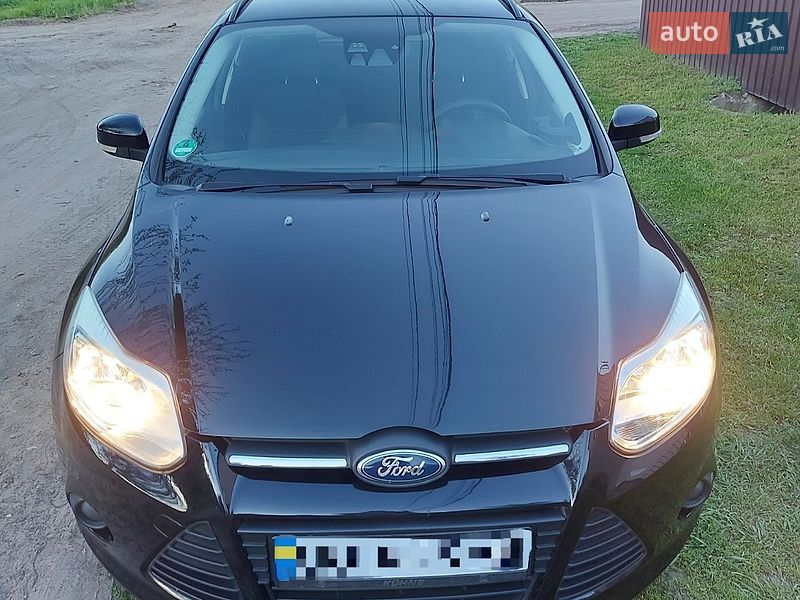 2011 Ford Focus, VIN WF0LXXGCBLBT80614:plate — фото 1 (autoria)