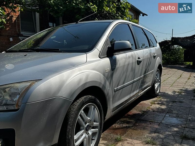 2007 Ford Focus, VIN WF0WXXGCDW7T13305:plate — фото 1 (autoria)