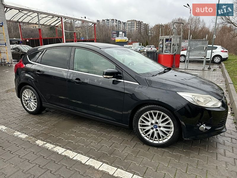 2011 Ford Focus, VIN WF0KXXGCBKBD09469:plate — фото 1 (autoria)