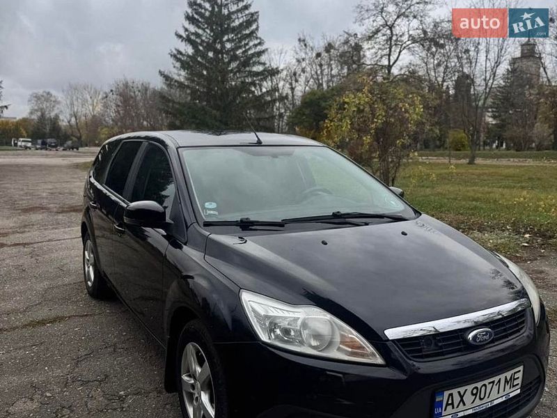 2008 Ford Focus, VIN WF0SXXGCDS8A78660:plate — фото 1 (autoria)