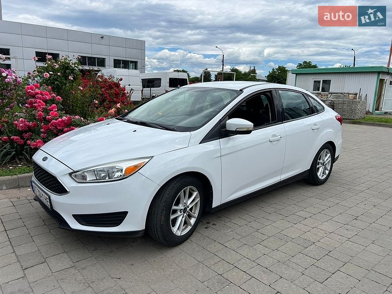 2015 Ford Focus, VIN 1FADP3F28FL296583:plate — photo 1 (autoria)
