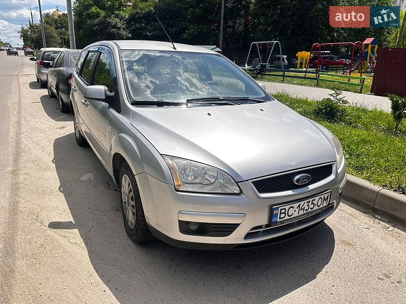 2007 Ford Focus, VIN WF0WXXGCDW7J29933:plate — фото 1 (autoria)