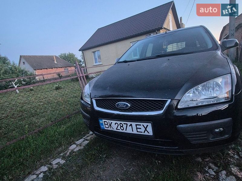 2006 Ford Focus, VIN WF0WXXGCDW6B73554:plate — фото 1 (autoria)
