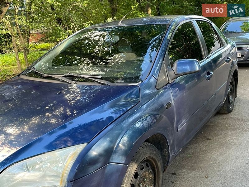 2007 Ford Focus, VIN WF04XXWPD47J14244:plate — фото 1 (autoria)