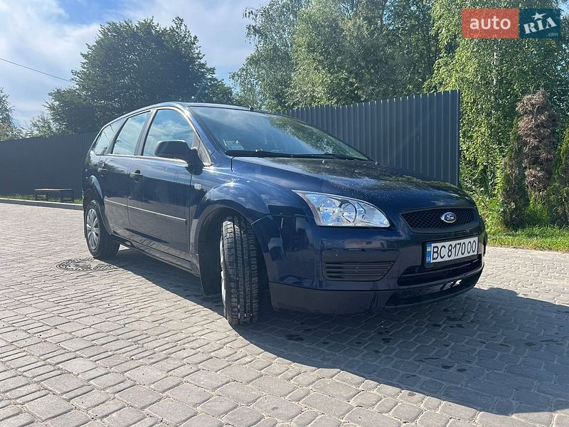 2006 Ford Focus, VIN WF0WXXGCDW6Y14924:plate — фото 1 (autoria)