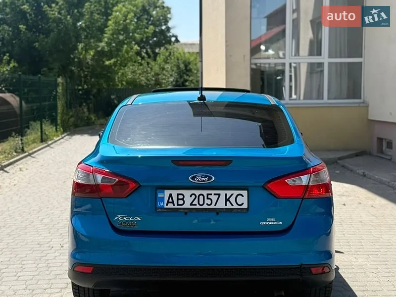 Ford Focus 2014 VIN 1FADP3F28EL397251 фото оголошення 5 з 60