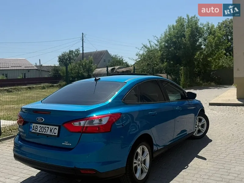 Ford Focus 2014 VIN 1FADP3F28EL397251 фото оголошення 4 з 60