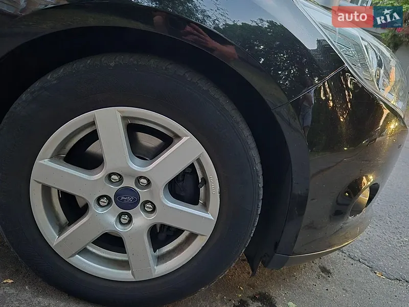Ford Focus 2011 VIN WF0KXXGCBKBK72615 фото оголошення 11 з 77