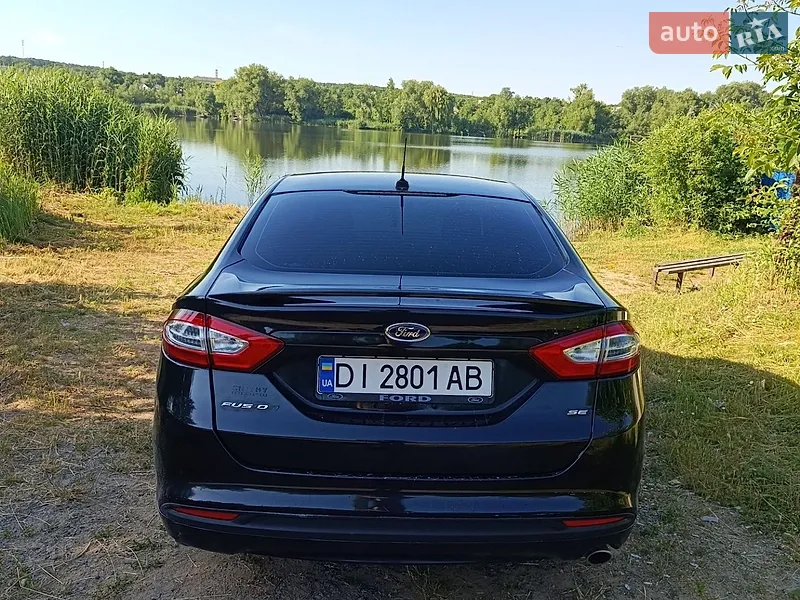 Ford Fusion 2013 VIN 1FA6P0H7XE5352509 фото оголошення 4 з 51
