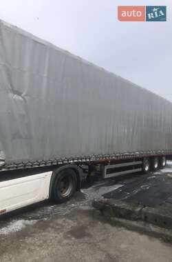 Бортовой полуприцеп Fruehauf T34 1999 в 