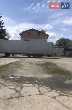 Бортовой полуприцеп Fruehauf T34 1999 в 