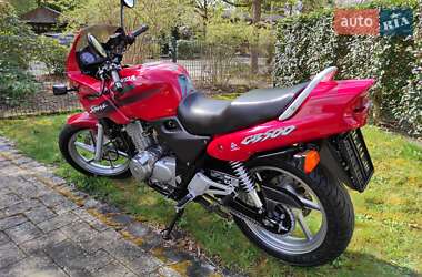 Мотоцикл Без обтекателей (Naked bike) Honda CB 500 1998 в 