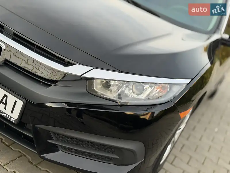 Honda Civic 2018 VIN 19XFC2F55JE036226 фото оголошення 14 з 111