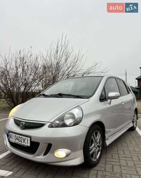 2008 Honda Jazz, VIN JHMGD18908S213041:plate — фото 1 (autoria)